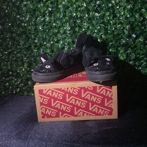 Fuzzy, black kitten sneakers!—Vans